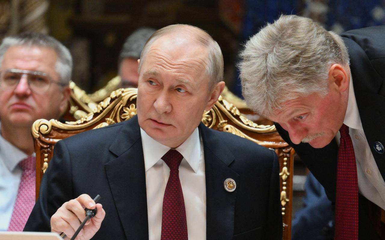 Kremlchef Putin und sein Sprecher Peskow